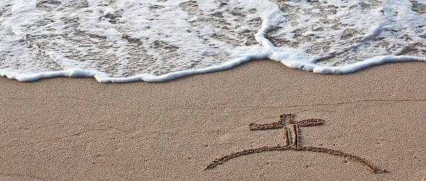 istock Cross in the Sand 175213944