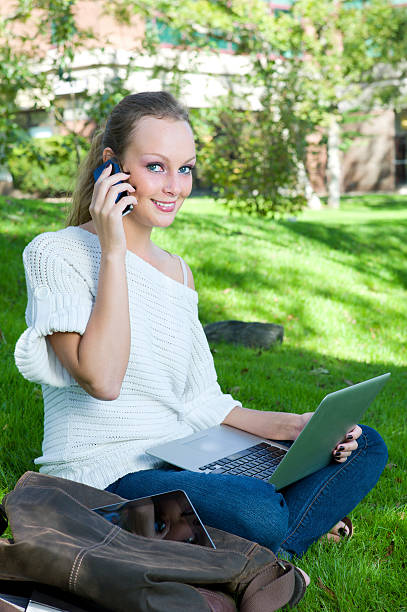 College Student Talking on a Mobile or Cell Phone.