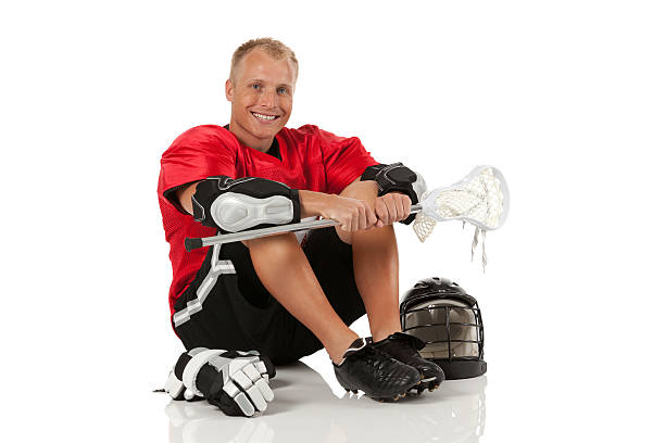 istock Happy lacrosse player sitting on the floor 175215231