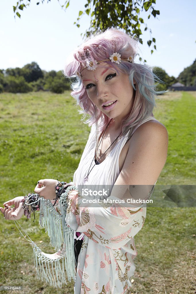 Funky Bohemian girl Pretty Hippie girl in flower headband. light and airy daylight mood.shallow depth of field.Festival fashion Adolescence Stock Photo