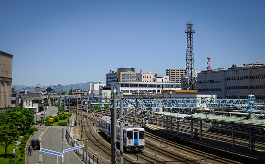 Yamagata, Japan - May 19, 2017. Trains stopping on the track at Shinkansen railway station in Yamagata, Japan. Yamagata City located in the Tohoku region of northern Japan.