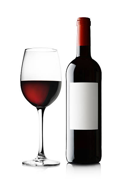 istock Glass and Bottle of Red Wine on White 175215940