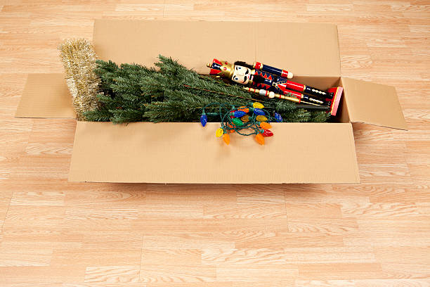 Christmas Tree and Decorations Box with an artificial Christmas tree and decorations. It's time to decorate for the holidays!Please also see: christmas decoration storage stock pictures, royalty-free photos & images