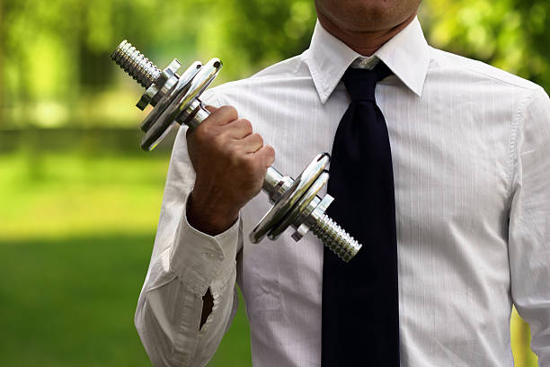 szkolenie biznesowe - businessman exercising training muscular build zdjęcia i obrazy z banku zdjęć