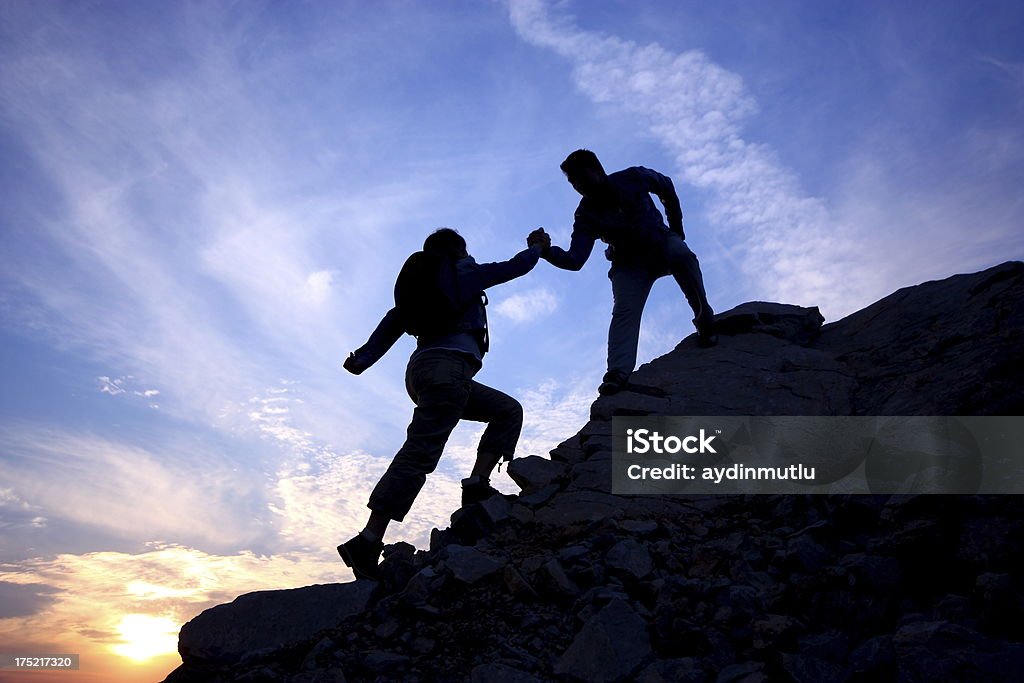 Helping hand Women Help from a Friend. Mountain Stock Photo