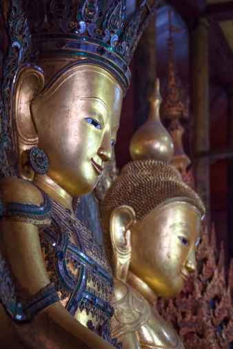 Buddha statues at the Nga Hpe Chaung monastery.More images of same photographer in lightbox: