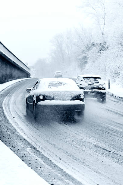istock Traffic on winter road 175217956