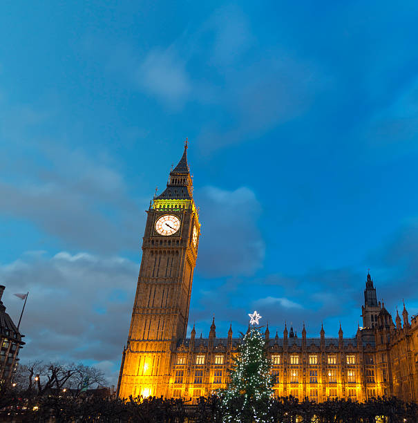 istock Big Ben in London with Christmas tree at dusk 175219681