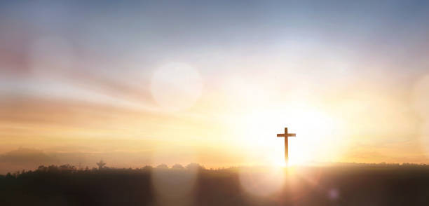 istock The cross on mountain sunset background 1752200164