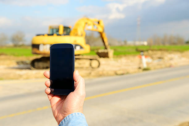 istock Filming W Smart Phone in Construction Site 175220347
