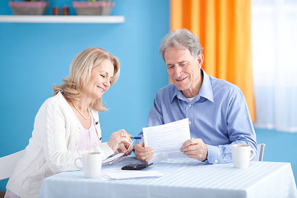 istock Senior couple with bills. 175222847