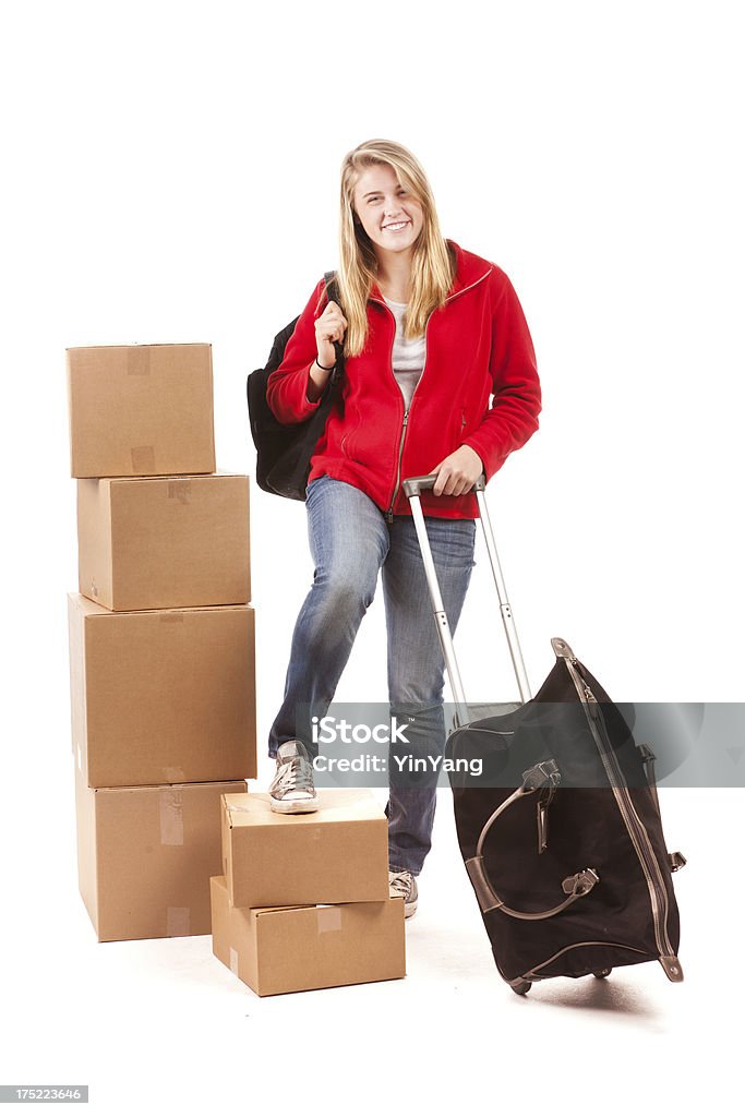 Студент обратно в школу двигаться в Dorm жилья на белом - Стоковые фото Багаж роялти-фри