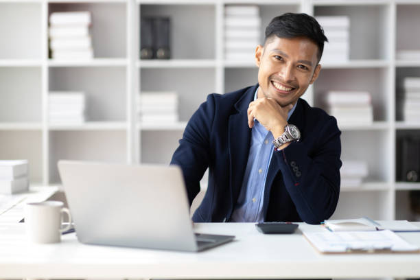 istock Businessman working with laptop on desk in office. 1752236684