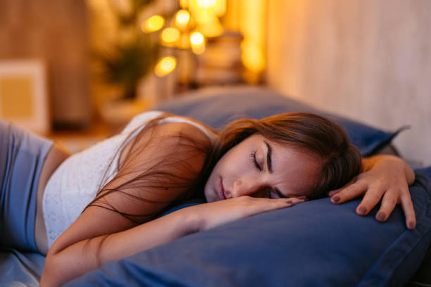 istock Young Woman Sleeping In The Bed At Night 1752236730