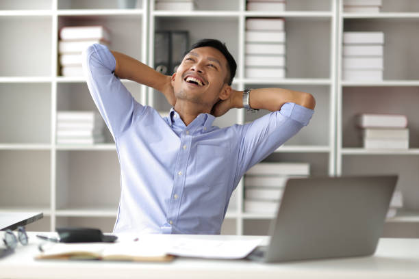 istock Business people working happily in the office. 1752237441