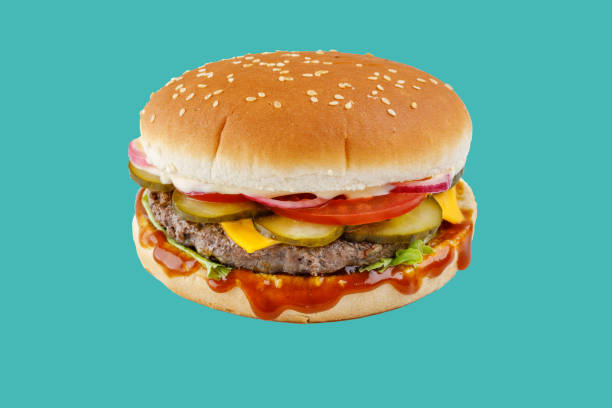 istock hamburger like in McDonald's with a beef cutlet on a green background, studio shooting 1 1752241390