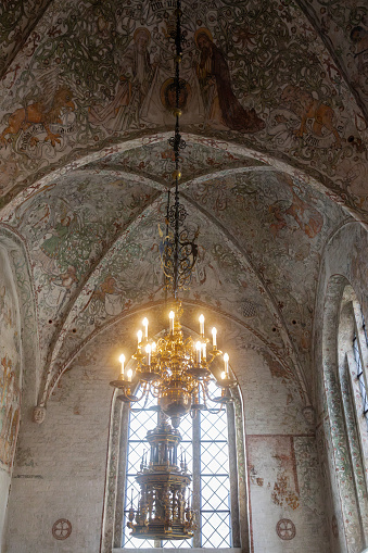The fresco most visible at the top of this medieval church is “The Veil of Veronica.”