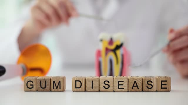 Phrase Gum Disease made of wooden cubes on clinic table