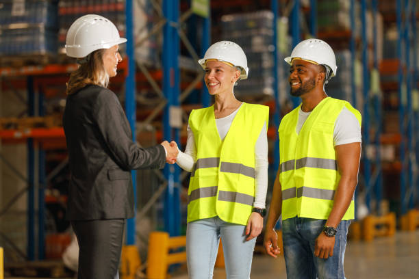 istock Female foreperson shakes hands with an employee 1752250411