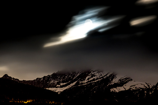 the Grivola and the moon photographed from Saint-Pierre in the Aosta Valley