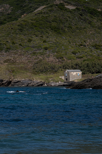 a small house facing the sea in Corsica