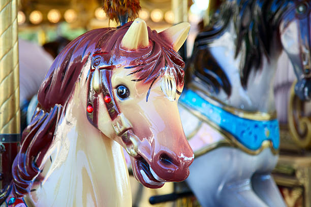 istock Horses on a carnival Merry Go Round 175225287