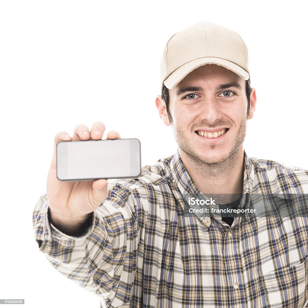 Hombre mostrando un teléfono inteligente - Foto de stock de 20 a 29 años libre de derechos