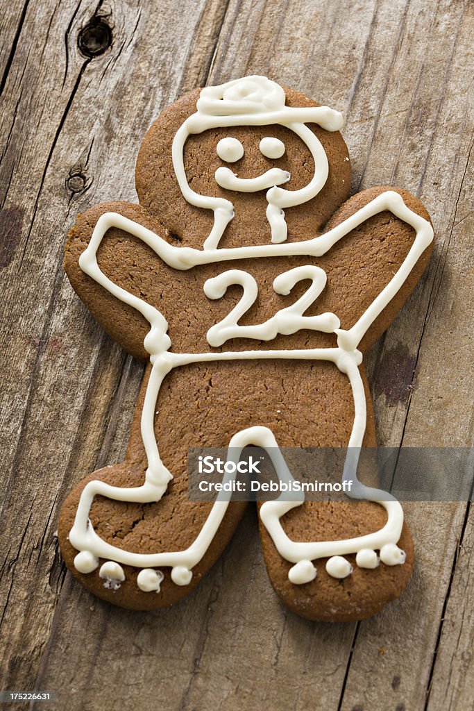 Roller Skating Dude A close up shot of a roller skating dude gingerbread man. He will roller skate right into your tummy. Shot on an old wooden background. Baked Stock Photo