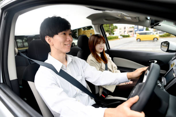 istock Young Asian couple enjoying driving 1752267509