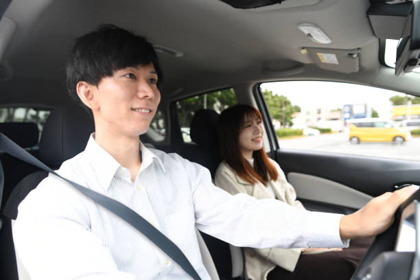 istock Young Asian couple enjoying driving 1752271970