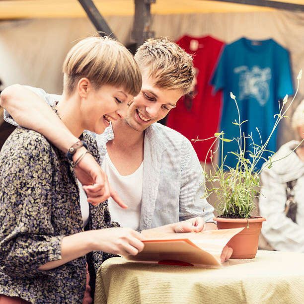 istock Couple reading a menu bar outdoors 175227331