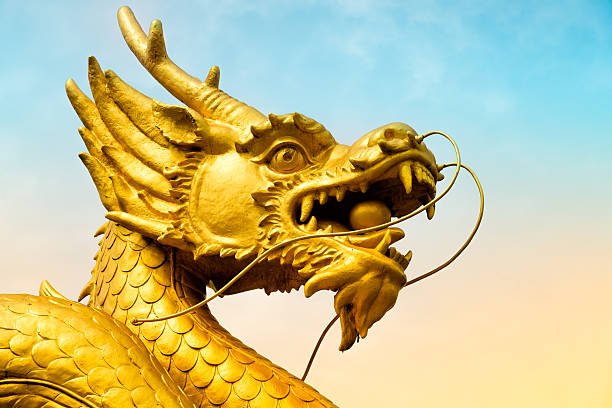 istock Golden dragon statue in temple 175228137