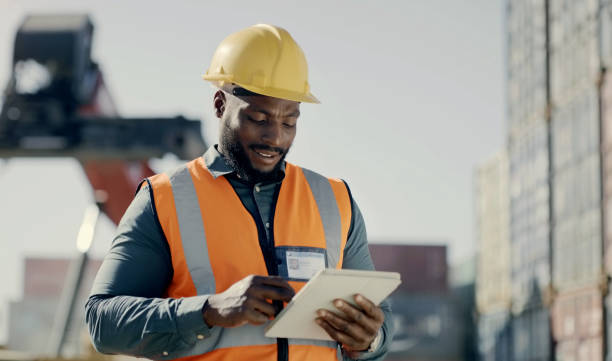 Shipping, cargo and man with tablet for logistics at industrial freight warehouse to check container. Online, app and technology for tracking worldwide commercial supply chain and distribution