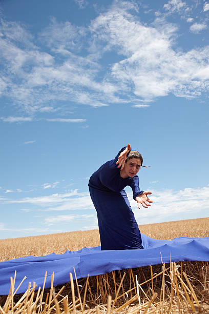 Woman Wearing Tent Dress In Cornfield Stock Photo - Download Image Now -  Activity, Adult, Blue - iStock
