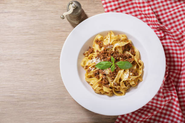 istock plate of pasta bolognese,  top view 1752290804