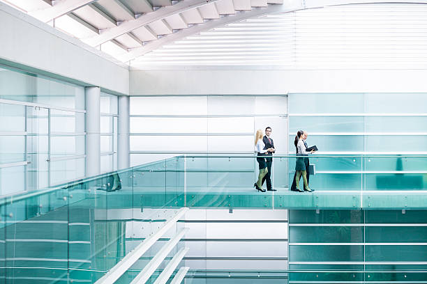 istock Business people walking in the office building 175230087