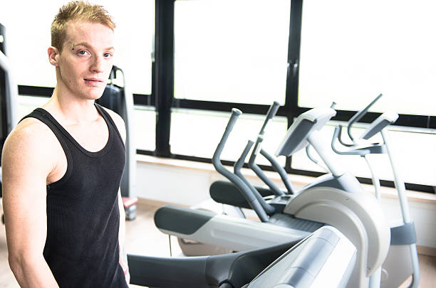 istock Healty lifestyle man walking on Treadmill 175230378