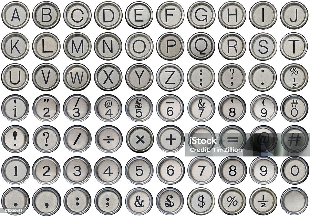 Antique Typewriter Alphabet, Numbers & Symbols Complete set of antique typewriter keys including the alphabet, isolated numbers, numbers with symbols, isolated symbols plus bonus mathematical signs, dollar and hash signs with one left blank for your own design all isolated on a white background, lined up with precision to ensure easy cut-out. Typebar Stock Photo