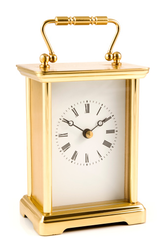 Carriage clock on a white background.