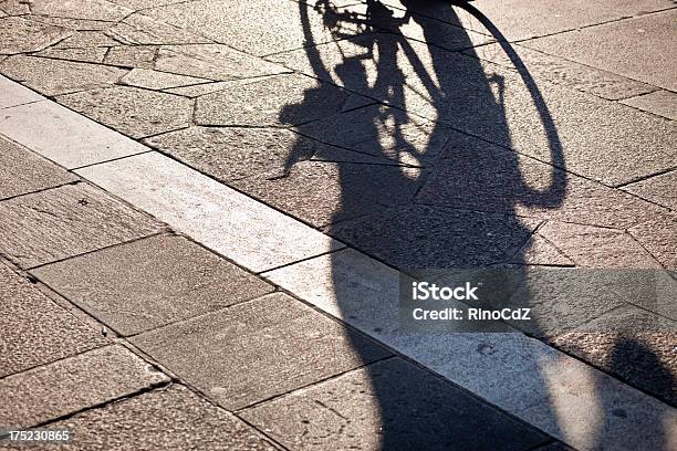 Marble And Stone Flooring With Shadow Of Cyclist Stock Photo - Download Image Now - Abstract, Back Lit, Backgrounds