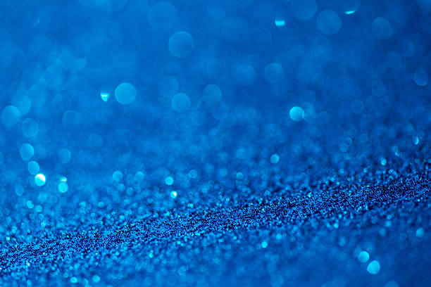 istock Abstract glittering paper christmas light turquoise defocussed background 175231408