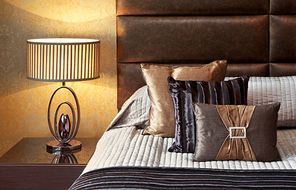 istock gold cushions and table lamp 175231733
