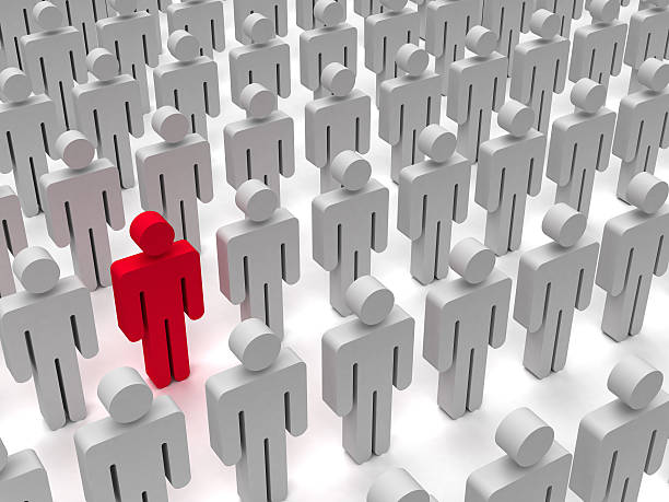 istock One human figure standing out from the crowd 175232179
