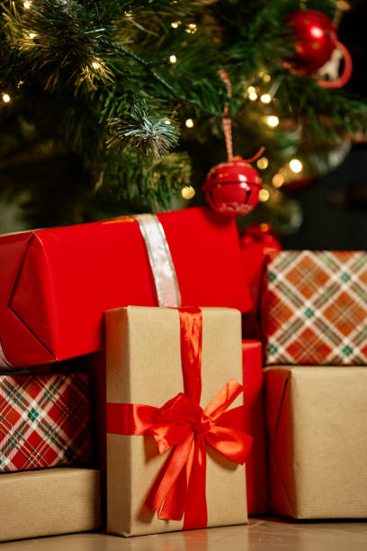 istock Presents under fir tree for Christmas holiday 1752322177