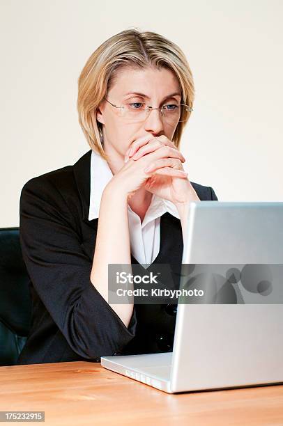 Pensive Working Woman Stock Photo - Download Image Now - 30-39 Years, Adult, Adults Only