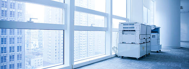 Angled photo of copier in high rise office building