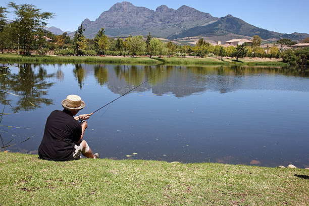 istock Man fishing at a lake 175233213