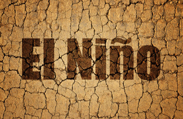 istock Dry cracked soil with El Nino text. 1752334049