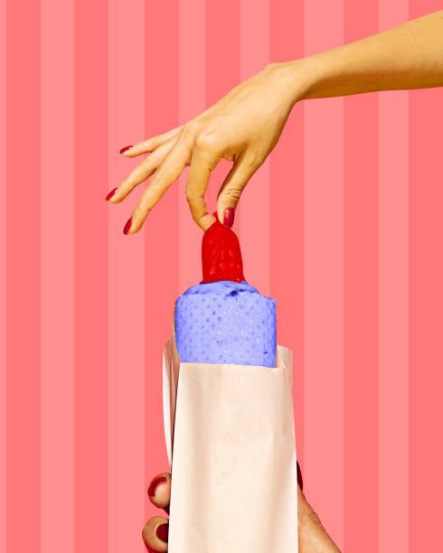 Poster. Contemporary art collage. Modern creative pattern. Hand holding bright colored delicious hot-dog against stripped pink background