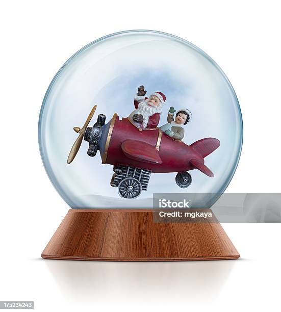 Santa With Plane In Snow Globe Stock Photo - Download Image Now - Snow Globe, Christmas Ornament, Cut Out